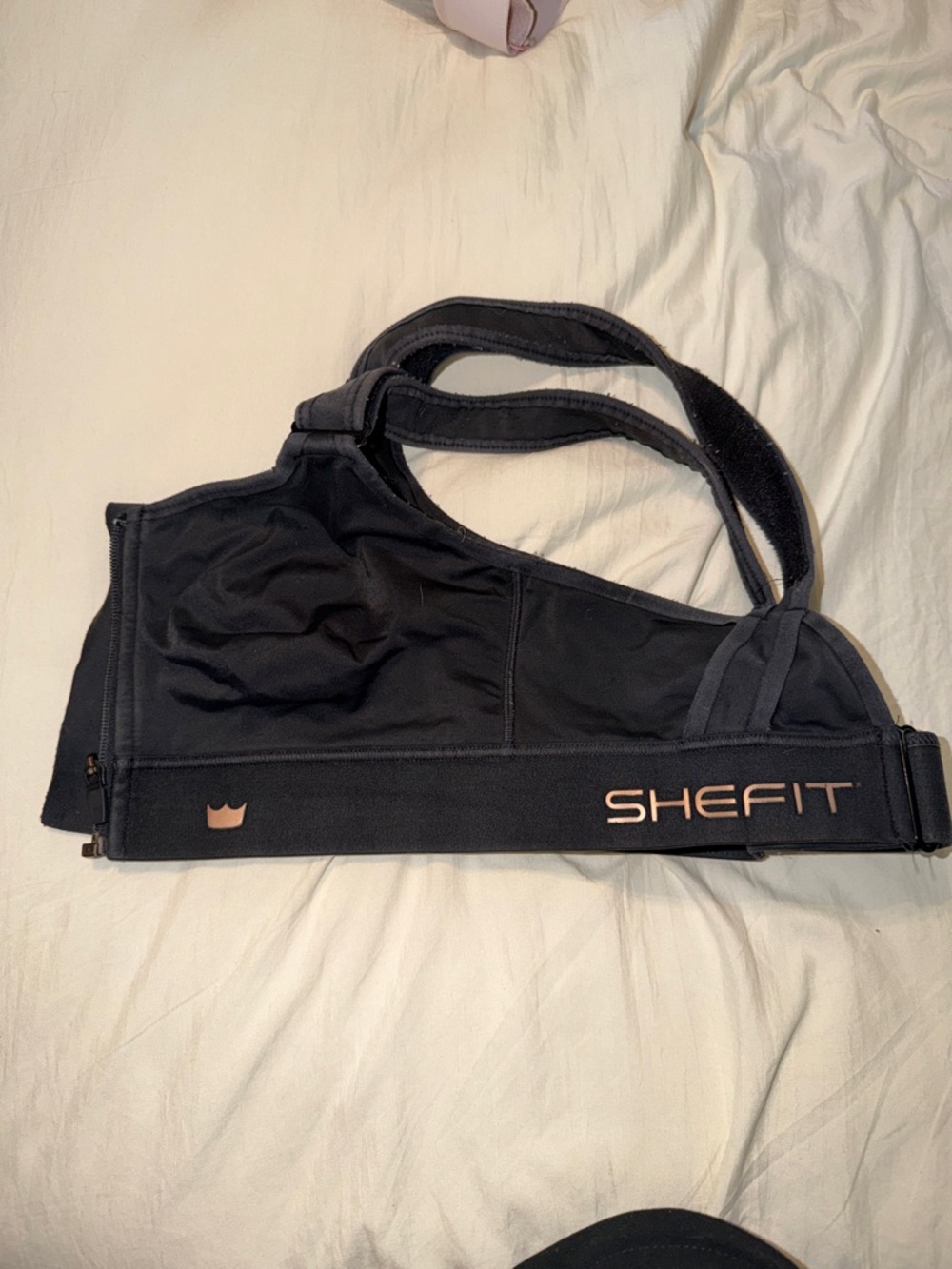 SHEFIT 1LUXE Black Sports Bra with Rose Gold Logo Accent